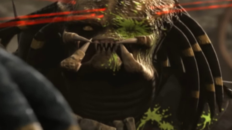 Laser sights against a Predator's forehead