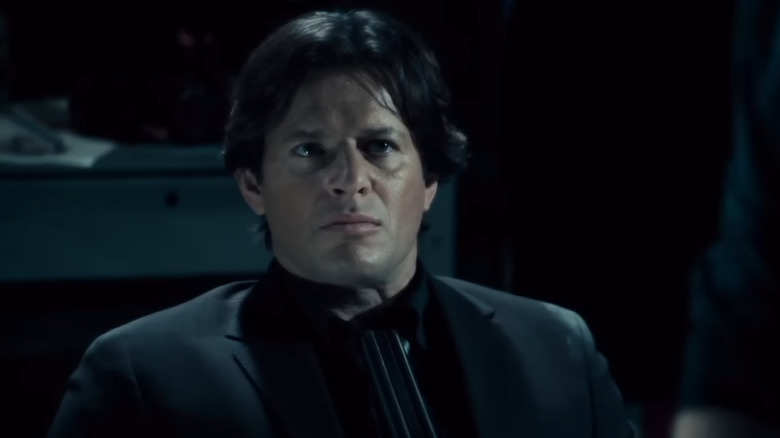 Costas Mandylor and Tobin Bell as Hoffman and John using the shot gun trap in Saw 5