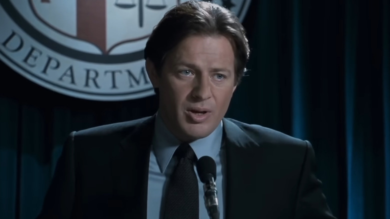 Costas Mandylor as Hoffman at a police press conference in Saw 5
