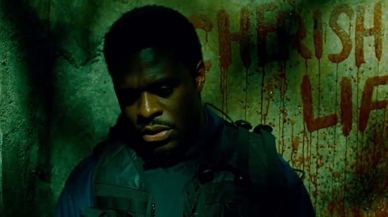 Lyriq Bent as Daniel Rigg in Saw 4