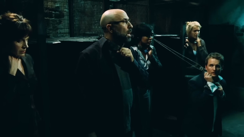 The Fatal Five prepare for their test in Saw 5