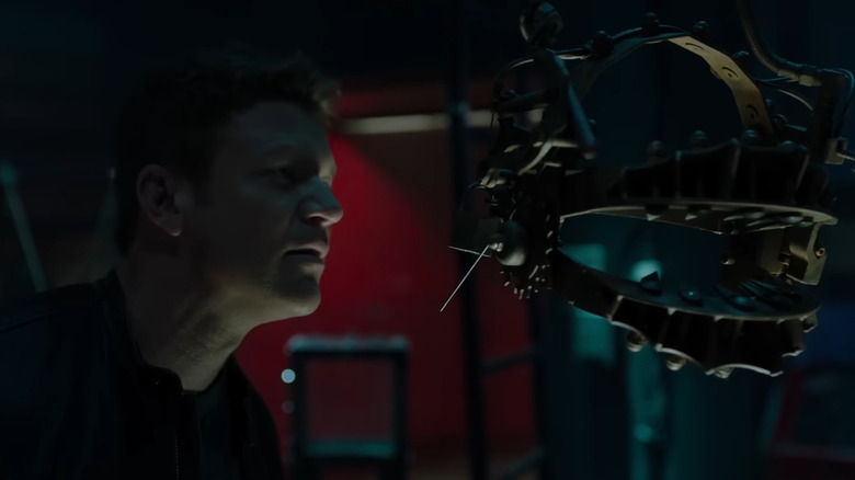 Matt Passmore as Logan Nelson, observing the reverse bear trap in Jigsaw