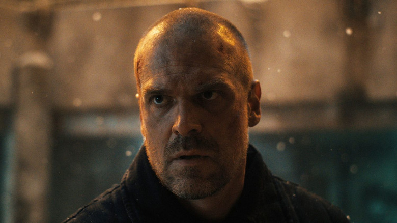 Hopper looking stunned in the snow in Stranger Things