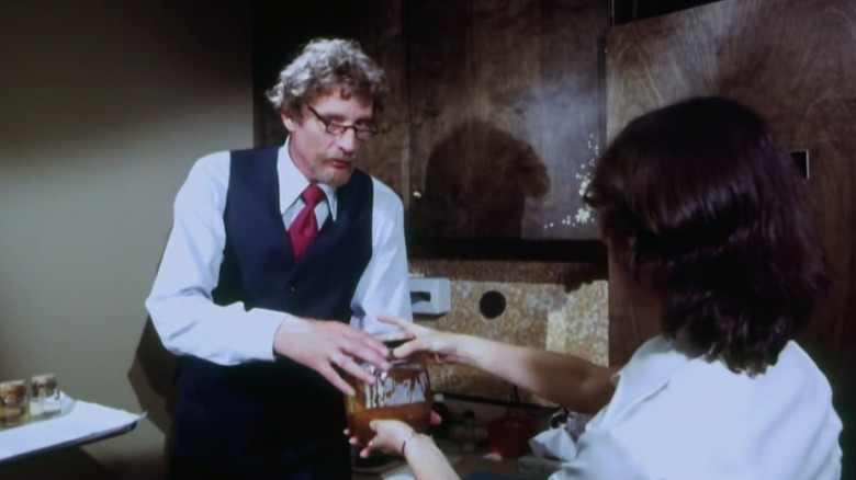 Dr. Gross (Michael Carr) handles a specimen in Faces of Death