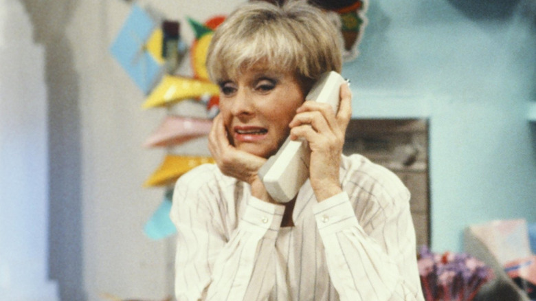 Cloris Leachman as Beverly Ann Stickle, holding a phone to her ear on "The Facts of Life"