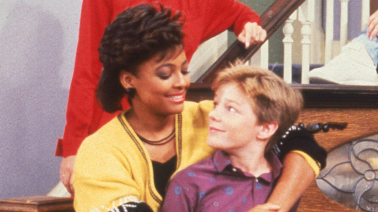 Kim Fields and Mackenzie Astin as Tootie Ramsey and Andy Moffett huggin on "The Facts of Life"