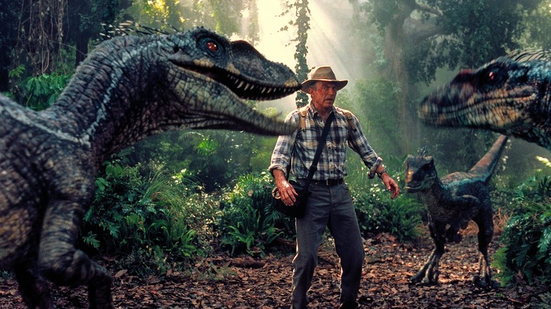 Sam Neill with raptors in Jurassic Park 3