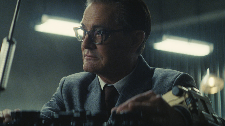 Hank sitting at a desk on 