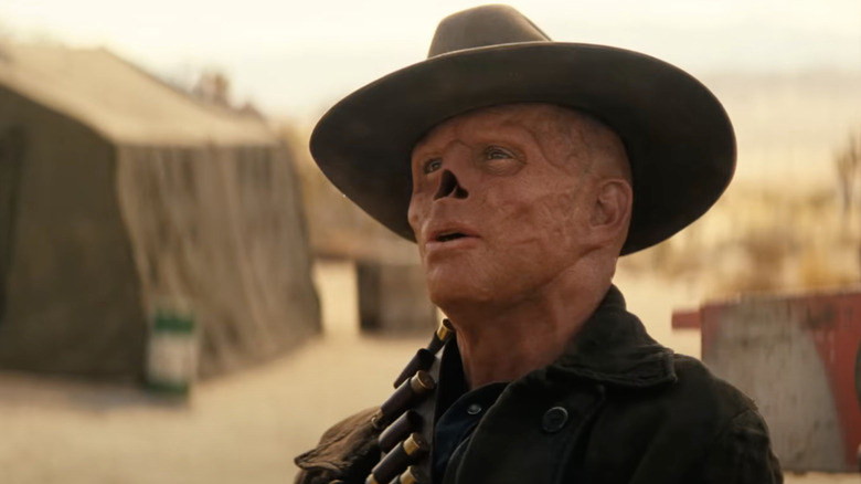Ghoul wears a hat talking to Lucy in the Fallout Season 2 trailer