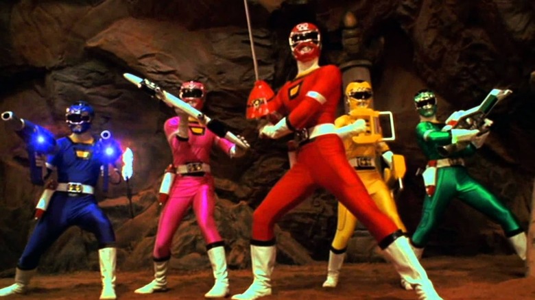 The Turbo Rangers do a heroic pose in Power Rangers Turbo