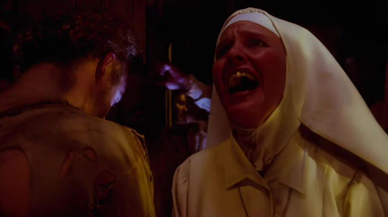 Amanda Krueger screaming next to a maniac in A Nightmare on Elm Street 5: The Dream Child