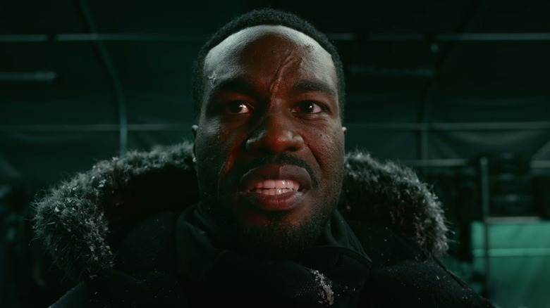 A close up of Yahya Abdul-Mateen II as Black Manta in his snow coat in Aquaman and the Lost Kingdom