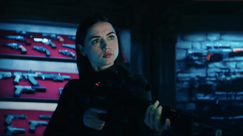 Anna De Armas Brands Gun in Runs with Guns Like Eva Macaro in Ballerina