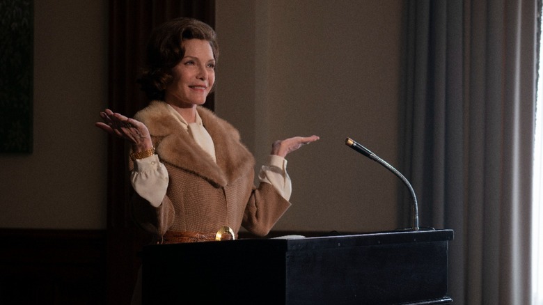 Betty Ford shrugging at podium