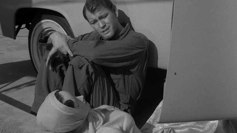Mike Ferris talking to a mannequin on the street on The Twilight Zone