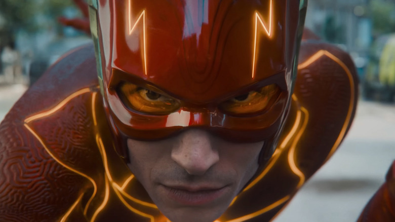 Ezra Miller's Barry Allen/The Flash is seen in closeup wearing his helmet in The Flash