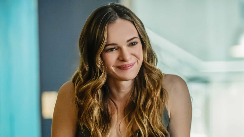 Danielle Panabaker as Gemma, smiling in Second Guessing Fate