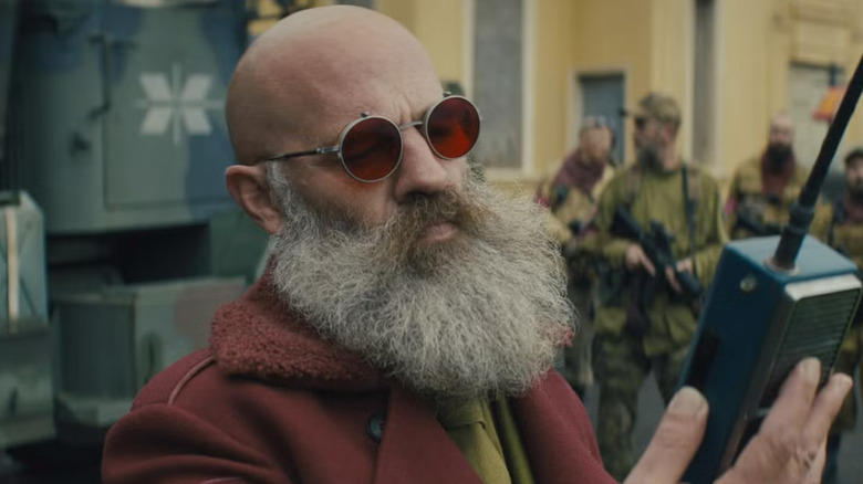 Neil Sandilands as General Abbott, speaking into a radio in Sweet Tooth