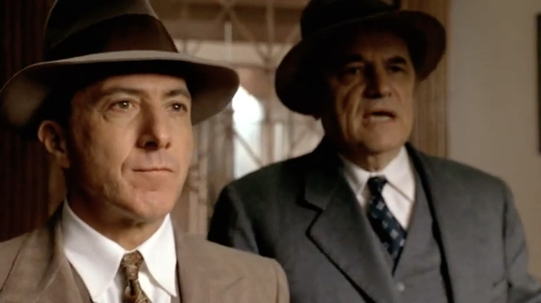 Dustin Hoffman as Dutch Schultz wears a hat in Billy Bathgate