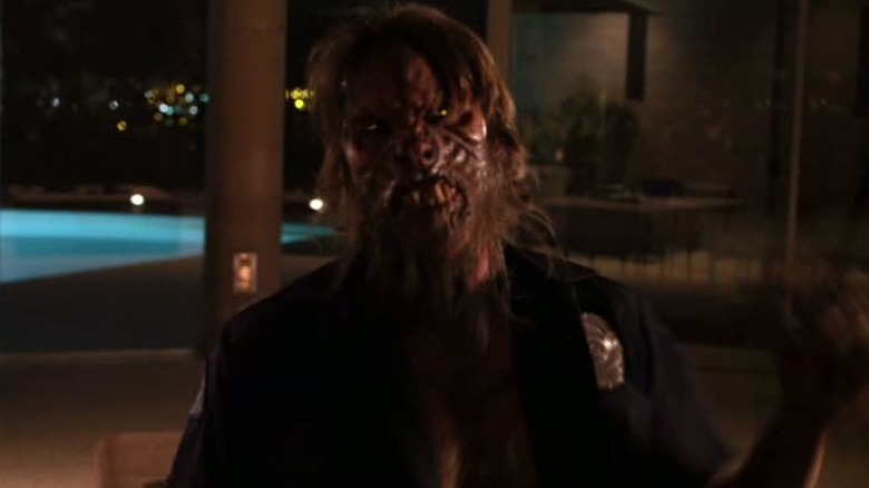 A werewolf hanging out near a swimming pool on Death Valley