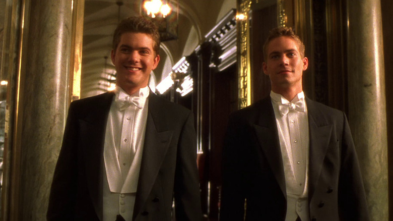 Lucas and Caleb in tuxedos at a fancy function in The Skulls