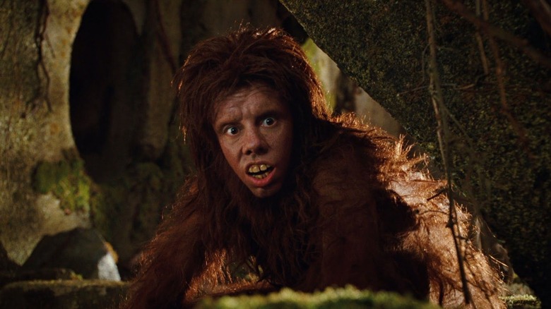 Chaka looking confused in a cave in Land of the Lost