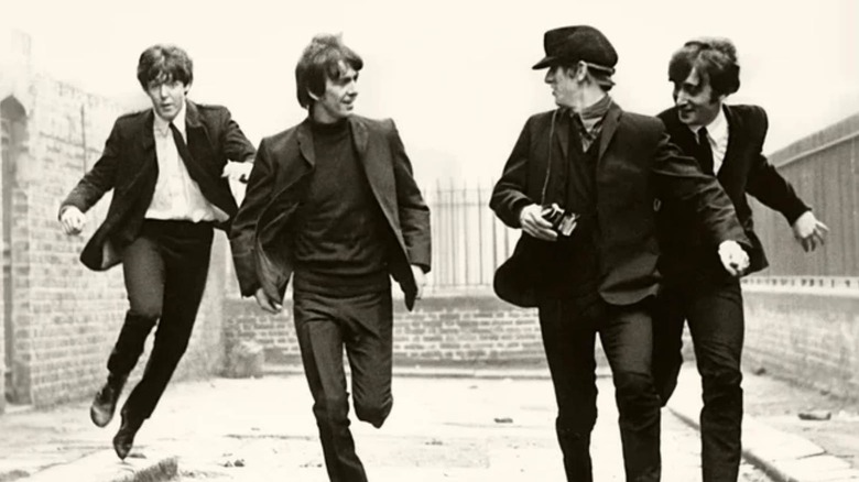 The Beatles running down a street in A Hard Day's Night