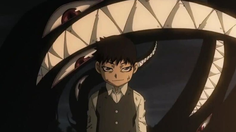 Selim Bradley/Pride grinning evilly as his shadow form lurks behind his human shell, in Fullmetal Alchemist Brotherhood