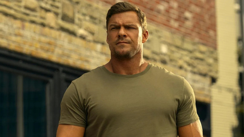 Jack Reacher walking down the street with confidence in Reacher