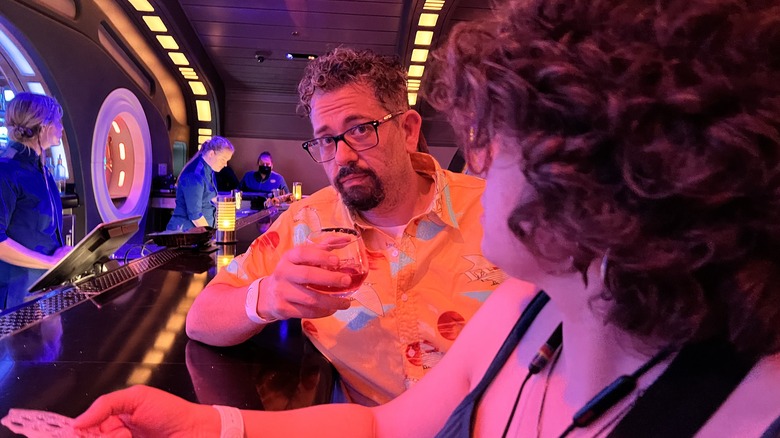 Bryan takes in a drink at the Sublight Lounge