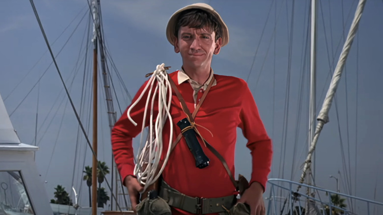 Bob Denver's Willy Gilligan stands in a classic red sweater on Gilligan's Island