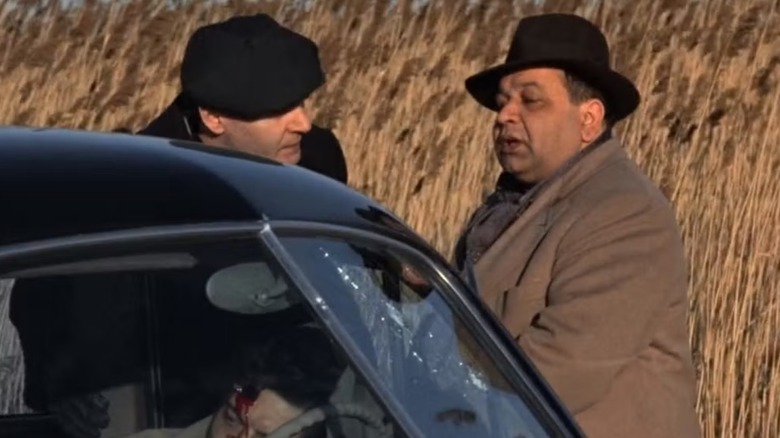 Clemenza and Gatto stood outside their car