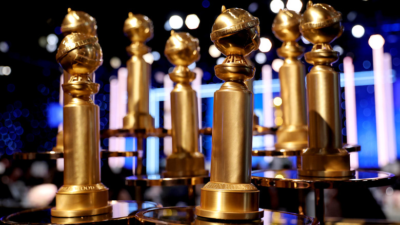 A cluster of Golden Globes Awards from the untelevised 2022 ceremony