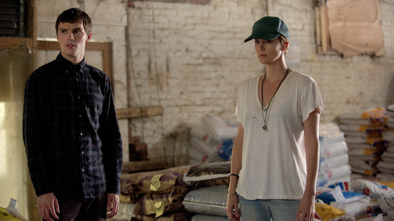 Nicholas Hoult as Lyle Wirth and Charlize Theron as Libby Day in Dark Places