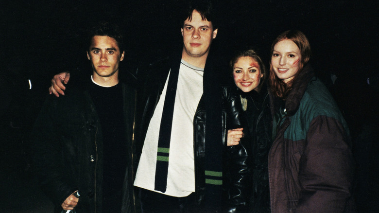 Jared Leto, Jamie Blanks, Rebecca Gayheart, and Alicia Witt on the set of Urban Legend
