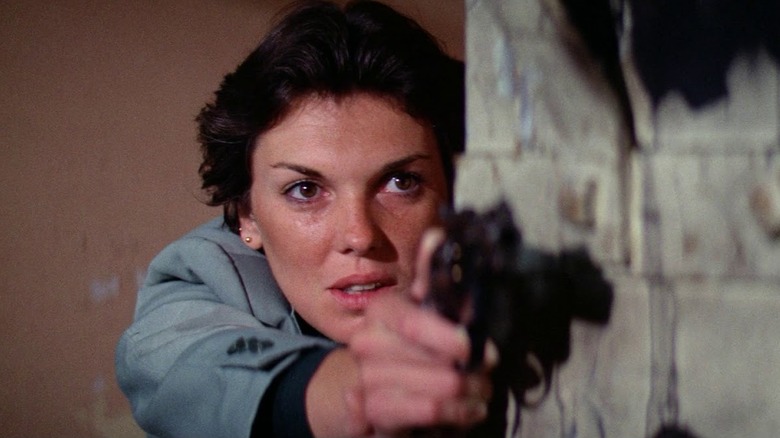Kate Moore firing weapon