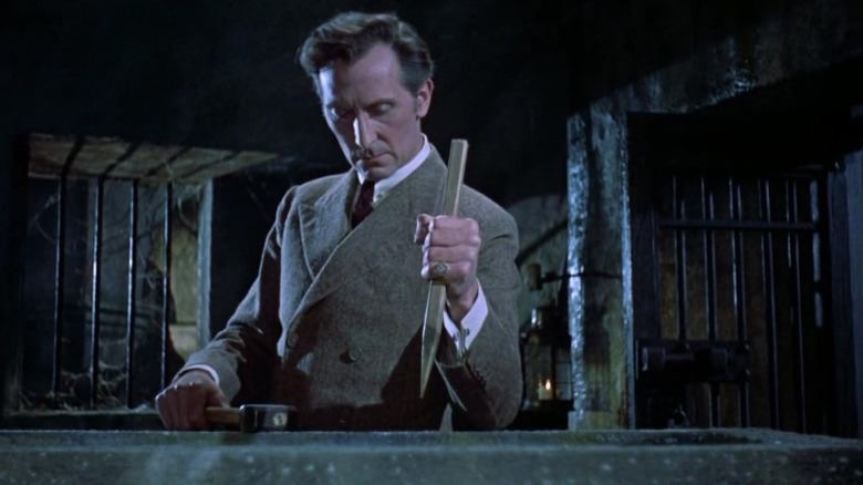 Peter Cushing with stake