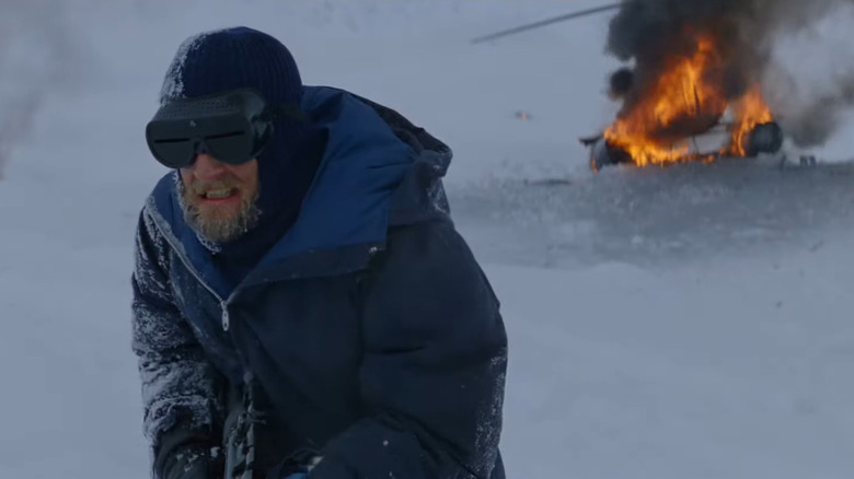The Thing Norwegian hunter and burning helicopter