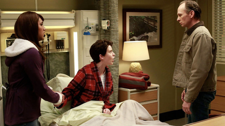 Jess Brian and Daniel arguing in a hospital room on Grey's Anatomy