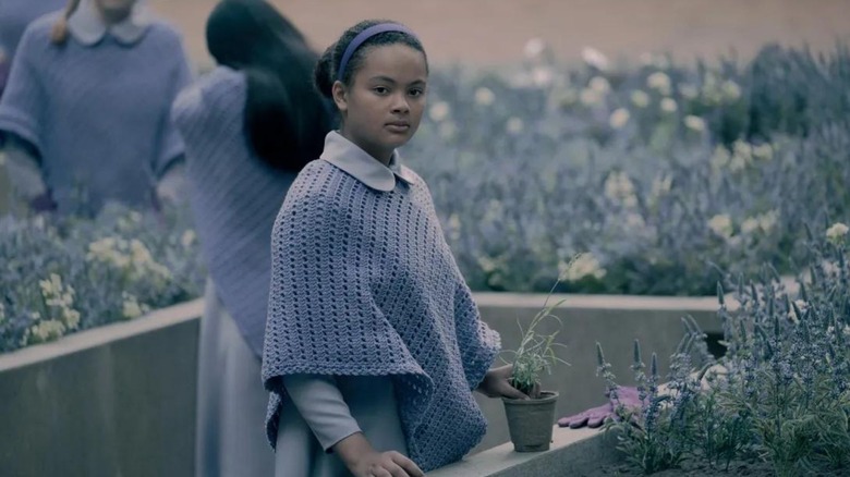 Jordana Blake as Hannah in The Handmaid's Tale