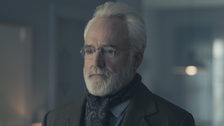 Commander Lawrence (Bradley Whitford) looks at someone off screen in The Handmaid's Tale