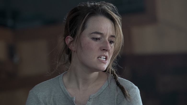 Abby gritting her teeth with hair around her face on The Last of Us
