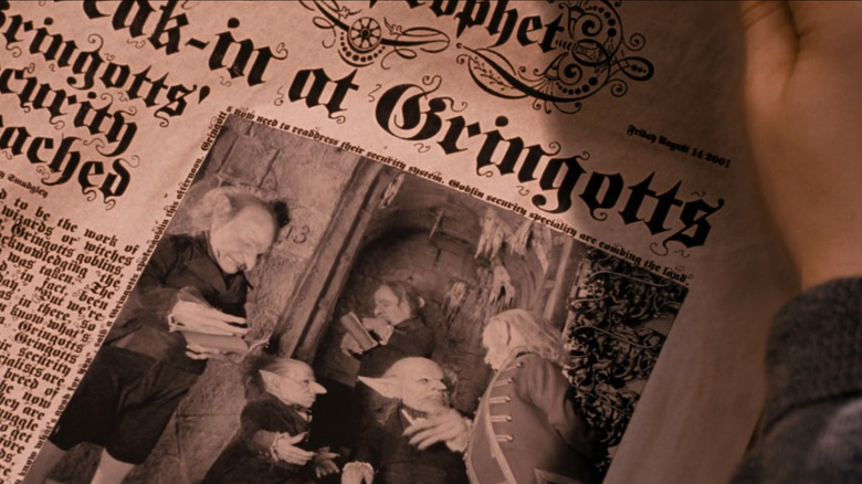 Sorcerer's Stone, a shot of the Daily Prophet. On the top right of the page we see "Friday August 14 2001"