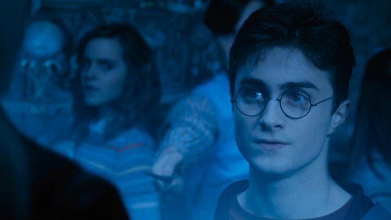 Order of the Phoenix, Harry staring down Lucious Malfoy, with Hermione and Neville at the ready behind him
