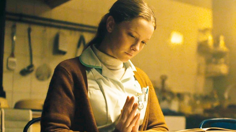 Saint Maud praying