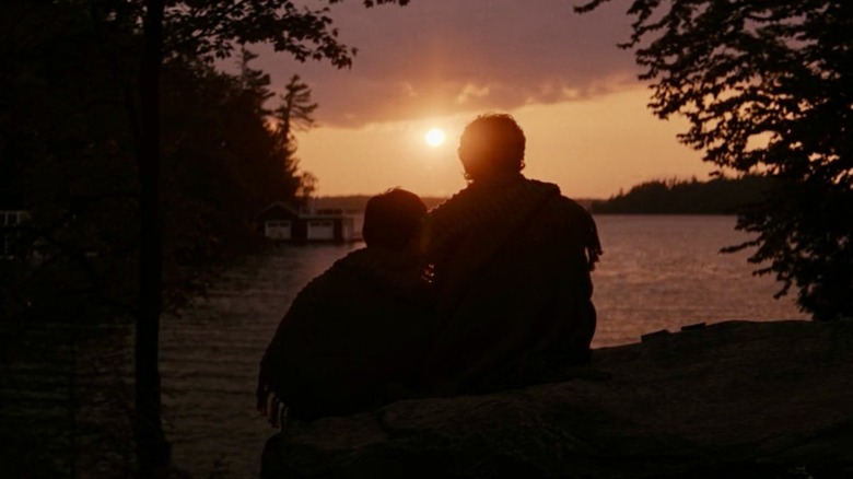 Shane and Ilya staring at the setting sun on Heated Rivalry