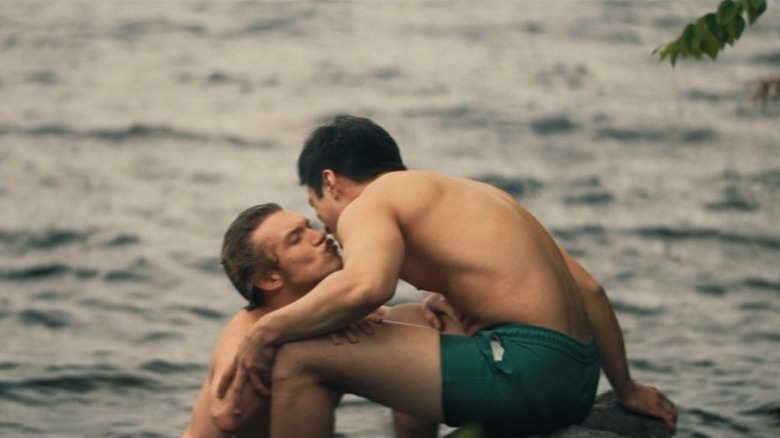 Shane and Ilya stealing a kiss in the lake in Heated Rivalry