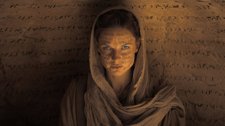 The Lady Jessica with runes written on her face in Dune