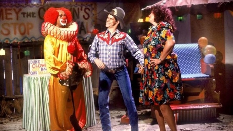 Homey the Clown talking to a cowboy and a woman on In Living Color