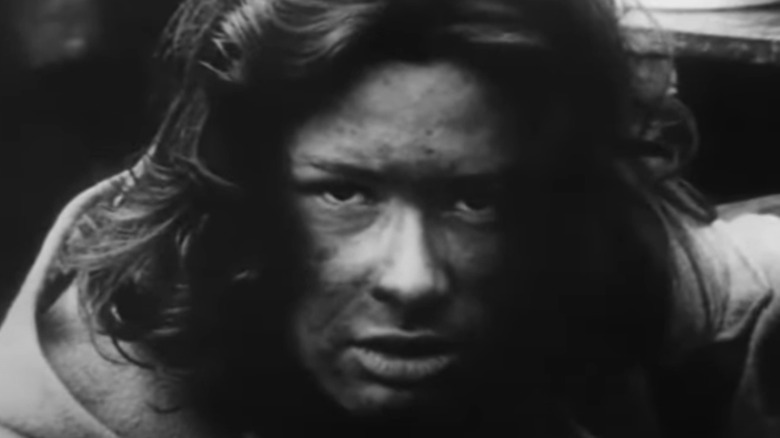 A child looks into camera in The War Game